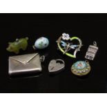 A silver stamp holder in the form of an envelope, enamelled brooch a/f, silver padlock,