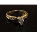 A gold ring set with marquis cut diamond, .48ct, stamped 14K.