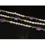 A three row suffragette coloured gemstone and natural pearl necklace,