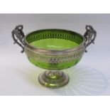 A WMF green glass bowl on silver plated pedestal with swan form handles,