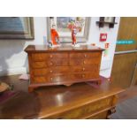 A burr elm collectors' chest, four short drawers over two long. 53.5cm x 25.