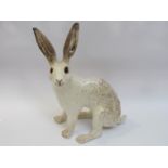 A Winstanley white seated hare, 38cm tall,
