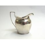 A George III silver cream jug maker's mark rubbed,