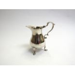 A George II silver cream jug Gurney & Cook 1737 of bulbous form with sparrow beak spout,