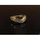 A 9ct gold and diamond wishbone ring, 1ct total. Size O, 3.