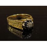 An 18ct gold sapphire and diamond ring. Size O, 4.