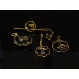 A 15ct gold brooch with chick detail,