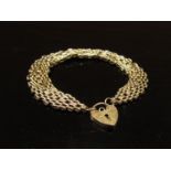 A 9ct gold bracelet with padlock clasp, 7.