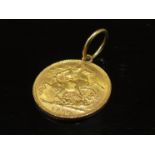 A 1917 gold sovereign with pendant loop, 8.