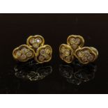 A pair of gold diamond set earrings, stamped 750, 1.10ct total, 12.