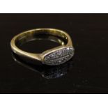 A gold ring with diamond chips stamped 18ct. Size L/M, 2.