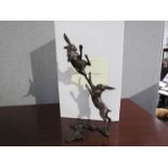 A pair of limited edition solid bronze boxing hares, boxed with certificate 24/250,