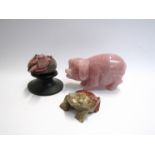 A rose quartz pig,