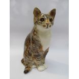 A Winstanley seated tabby cat,