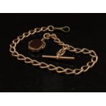 A 9ct rose gold watch chain, 30cm long with swivel seal fob, 54.