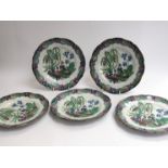 Five Victorian plates decorated with exotic birds, marked No. 84 to base, 23.