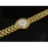 A Maurice Lacroix gold plated lady's quartz bracelet watch with mother-of-pearl dial,