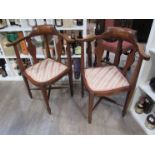 A pair of mahogany corner chairs