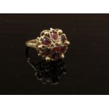 A 9ct gold garnet crown ring. Size N, 4.