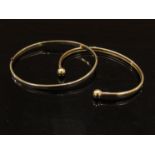 A 9ct gold bangle with ball finials and a 9ct gold bangle, 6.