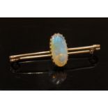 An Edwardian (1903) opal and 9ct rose gold bar brooch, 16mm x 8mm opal, 4.