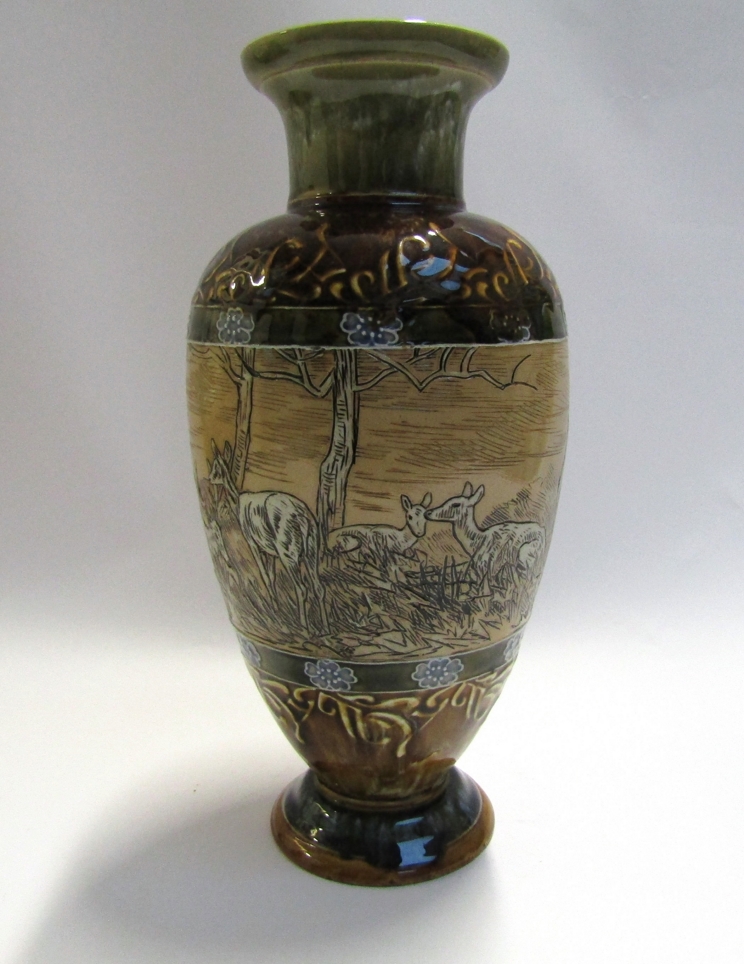 A Doulton Lambeth vase, deer at rest under tree, by Hannah B.