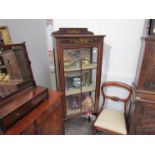 An Edwardian slim single door china display cabinet,