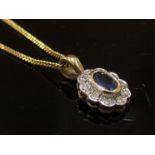 A 9ct gold sapphire and diamond pendant hung on 9ct gold chain, 46cm long, 3.