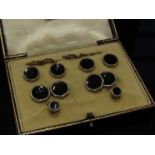 A vintage cased set of Austin Reed London shirt buttons and cufflinks