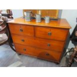 A circa 1860 Cuban mahogany chest of two short over two long drawers on turned feet,