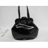 LULU GUINNESS large Pollyanna bag. This fabulous black bag has a patent leather body.
