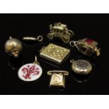 Various charms including Coach, telephone, coffee bean,