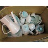 A quantity of Poole pottery including tea/coffee pots, cups, saucers and bowls a/f,