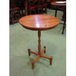 A country pine wine table with turned column and quatreform base,