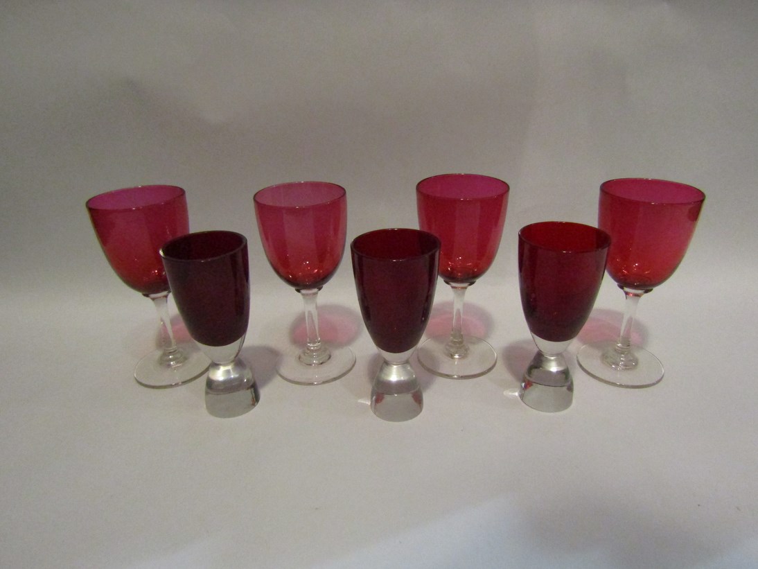 A selection of red bowled glasses,