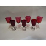 A selection of red bowled glasses,