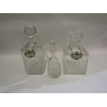 Two heavy glass decanters with ceramic spirit labels and another (3)