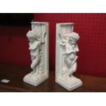 A pair of art form "Little Thinker" bookends,