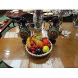 A pair of covered vases with fruit cartouches and a ceramic display of fruit (3)