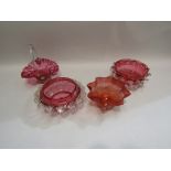 Four pieces of Victorian cranberry glass (three bowls and one basket)