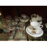 An assortment of pheasant painted glassware and ceramics