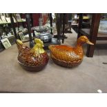 Two lidded casserole dishes,