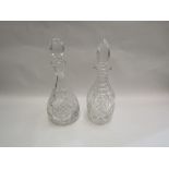 Two cut glass decanters with stoppers