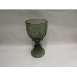 A smoke glass oversized decorative goblet,