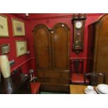 A 20th Century Butilux Queen Anne style two door wardrobe on three drawer base,