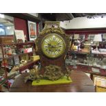 A 19th Century French ebonised and boulle work bracket clock of waisted form,
