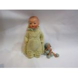 An early 20th Century German doll stamped 247 U-7 and a small doll