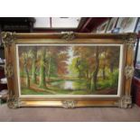 An oil on canvas of Autumnal woodland scene, classical gilt frame, signed lower right,