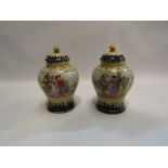 A pair of Victorian classically decorated vases and covers