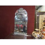 A modern Venetian style mirror with floral spray decoration,